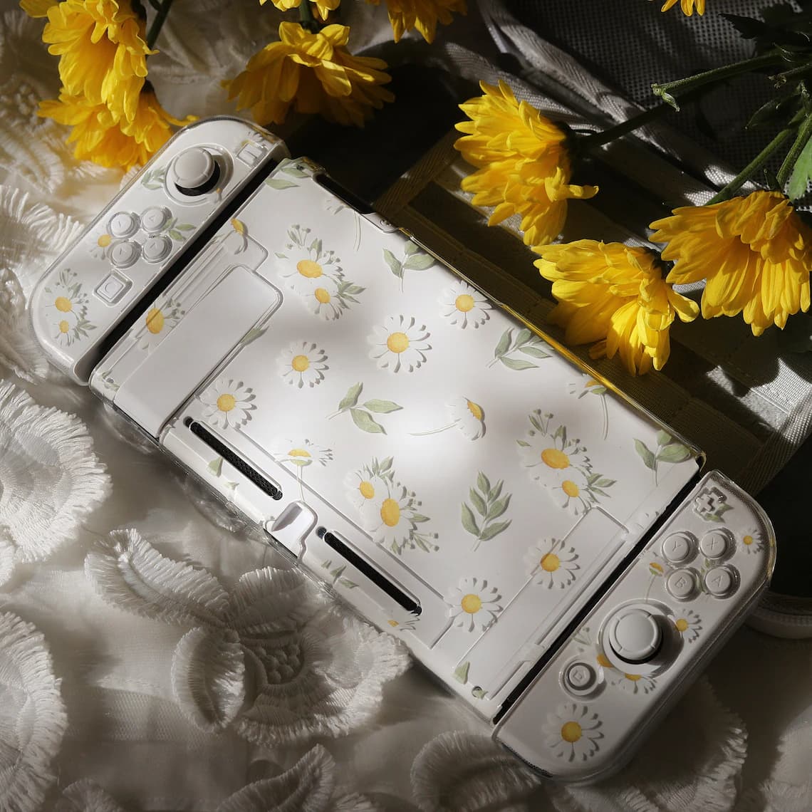 Side angle of Nintendo Switch assembled with clear Daisy Daydream case showing daisy pattern across console and Joy-Con covers
